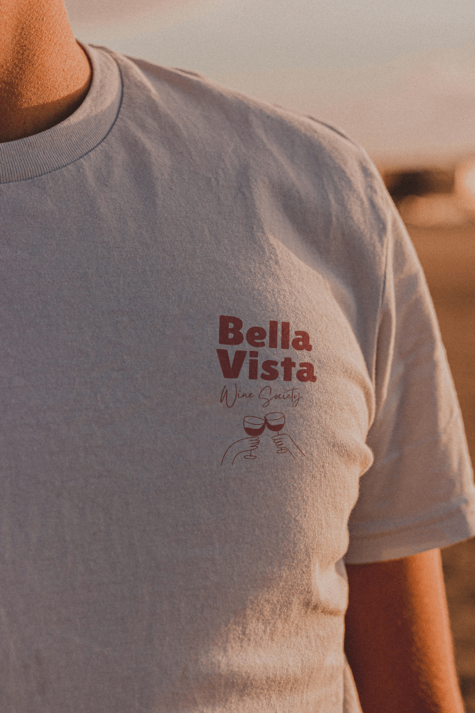 Boy wearing a t-shirt with Bella Vista Wine Society logo